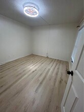 1799 N Highland Ave, Unit E103 in Clearwater, FL - Building Photo - Building Photo