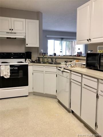 3413 NW 44th St-Unit -105 in Lauderdale Lakes, FL - Building Photo