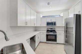 19596 Hinkley Dr in Estero, FL - Building Photo - Building Photo