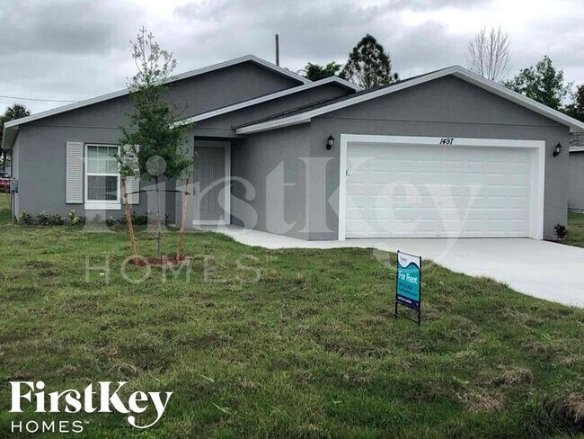 property at 1497 SW San Sebastian Ave