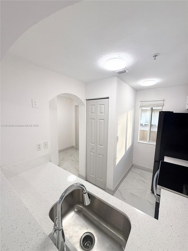 property at 7991 NW 8th St