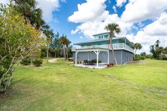 10440 Yacht Basin Dr in Placida, FL - Building Photo - Building Photo