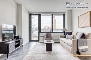 250 E Houston St, Unit SI FL7-ID179 in New York, NY - Building Photo