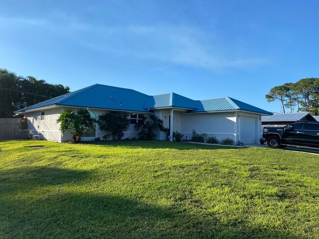 property at 3196 SW Areca Dr