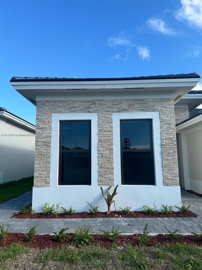 property at 14430 SW 18th St