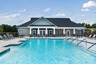 Village at Hunter's Run Apartments in Pembroke, NC - Building Photo - Building Photo