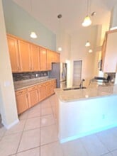 Lakefront home very spacious with a screened in pool in Heathrow in Lake Mary, FL - Building Photo - Building Photo