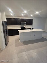 27833 Solis Grande Dr in Bonita Springs, FL - Building Photo - Building Photo