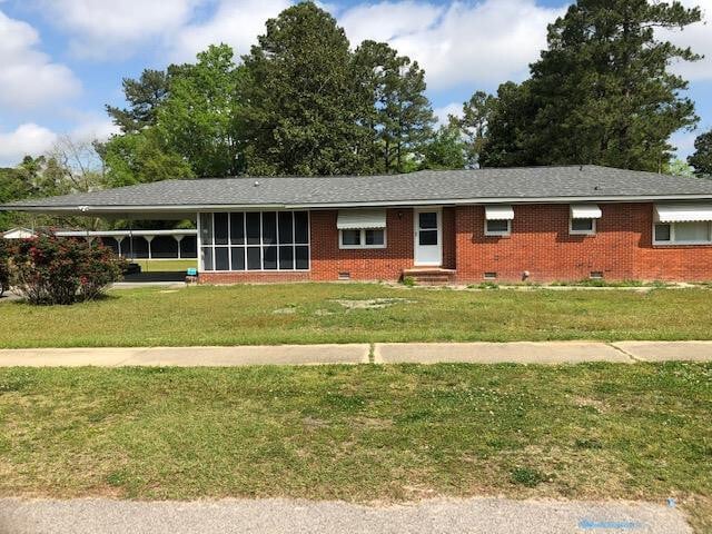 property at 421 W Huggins St