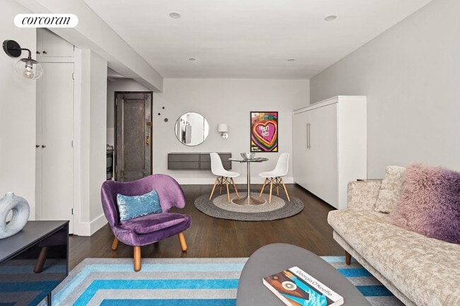 54 E 8th St in New York, NY - Building Photo - Building Photo