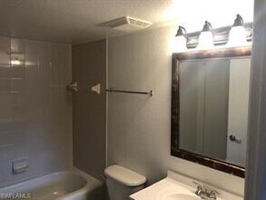 8235 Ibis Club Dr-Unit -309 in Naples, FL - Foto de edificio - Building Photo