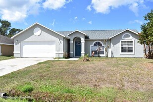 482 Tuloma Ave SW in Palm Bay, FL - Building Photo