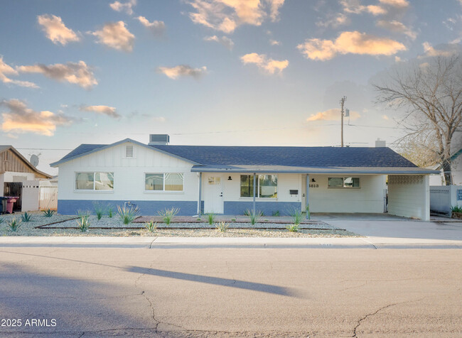 property at 6813 E Belleview St