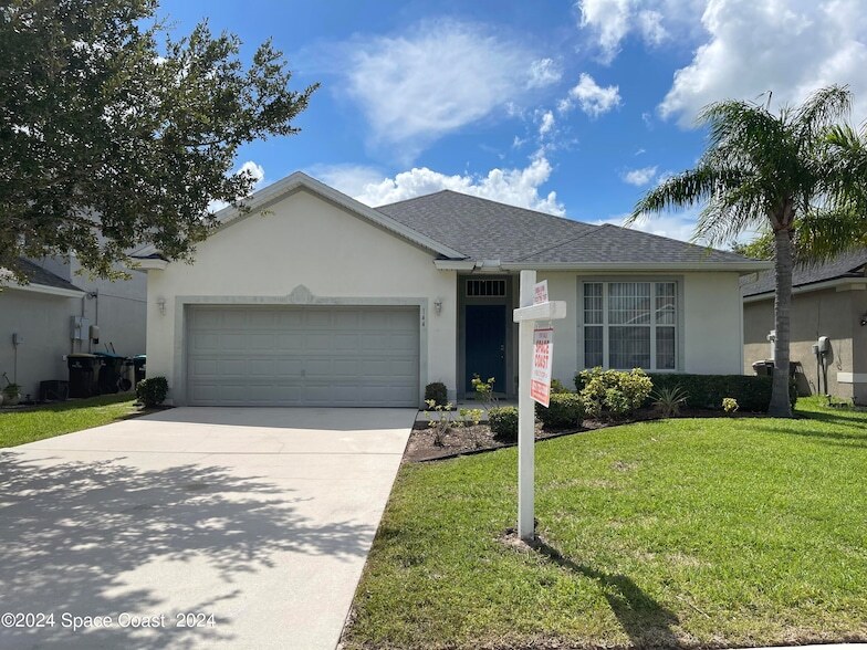 144 Wishing Well Cir SW, Unit 1812 in Palm Bay, FL - Building Photo