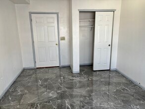 4451 S Ammons St, Unit 1-101 in Denver, CO - Building Photo - Building Photo