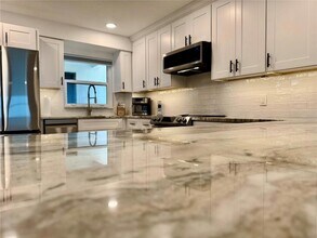 1270 Gulf Blvd, Unit 904 in Clearwater, FL - Building Photo - Building Photo