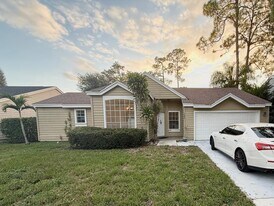1049 Mourning Dove Ln in Wellington, FL - Building Photo
