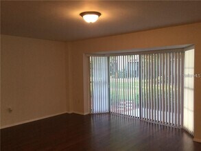 5999 Village Cir N in Orlando, FL - Building Photo - Building Photo