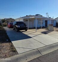 11329 W Duluth Ave in Youngtown, AZ - Building Photo