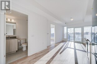 7439 Kingston Rd in Toronto, ON - Building Photo
