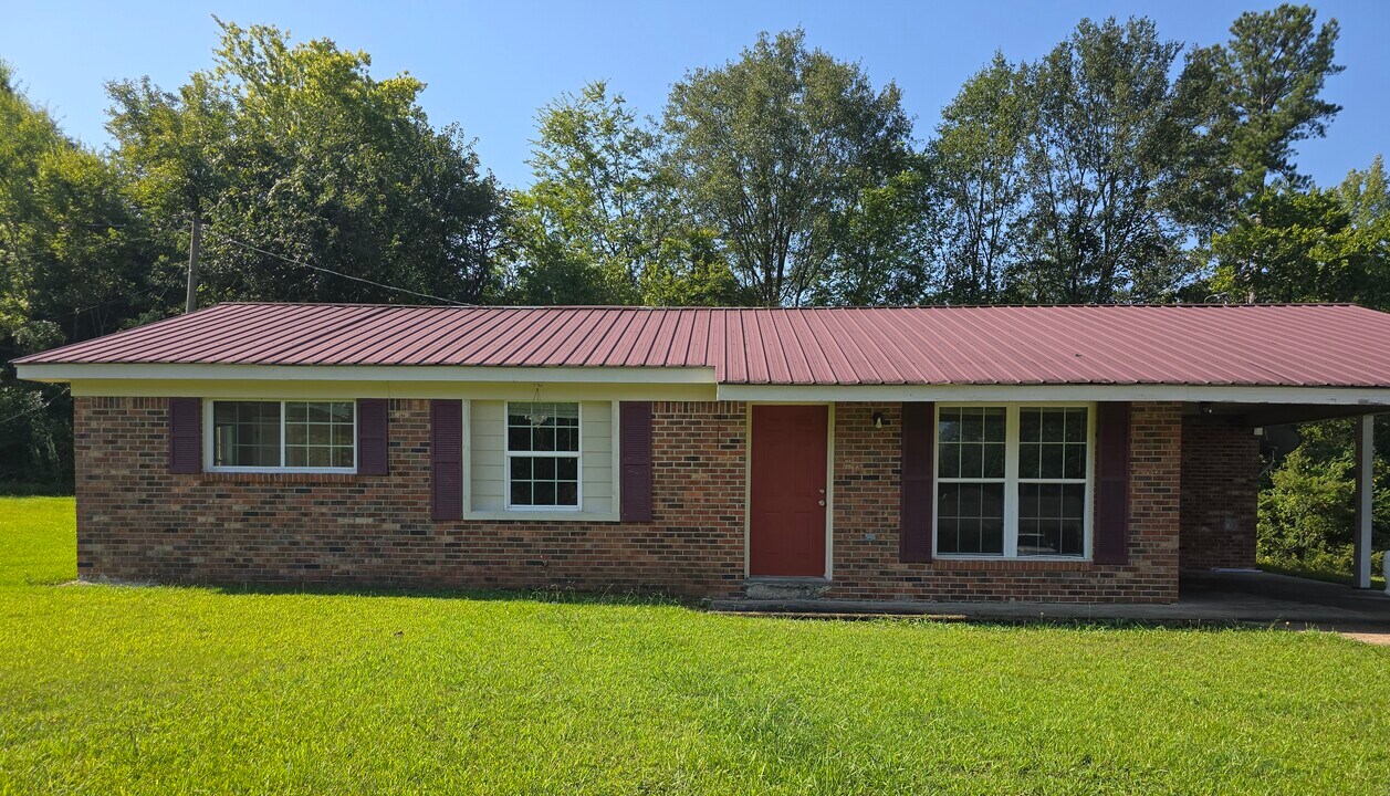 106 Mae St in Starkville, MS - Foto de edificio