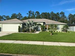 104 S Coopers Hawk Way in Palm Coast, FL - Building Photo