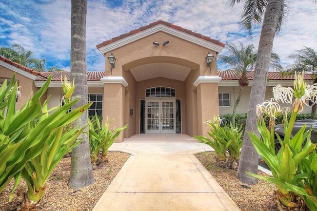 616 Executive Center Dr, Unit 102 in West Palm Beach, FL - Foto de edificio - Building Photo