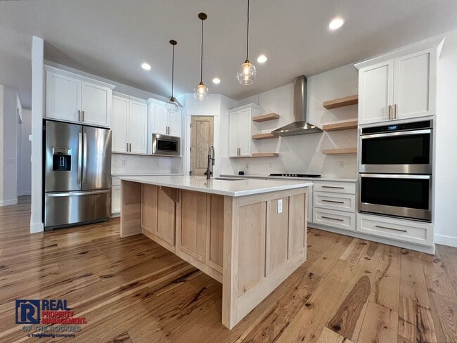 Gorgeous 4 bed 3 bath + Office home located on the 12th Tee of the TPC golf Course! in Berthoud, CO - Building Photo - Building Photo