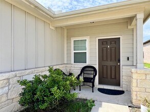 220 Pepperbark Loop in Mustang Ridge, TX - Building Photo - Building Photo
