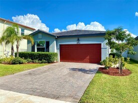 7879 NW Greenbank Cir in Port St. Lucie, FL - Building Photo