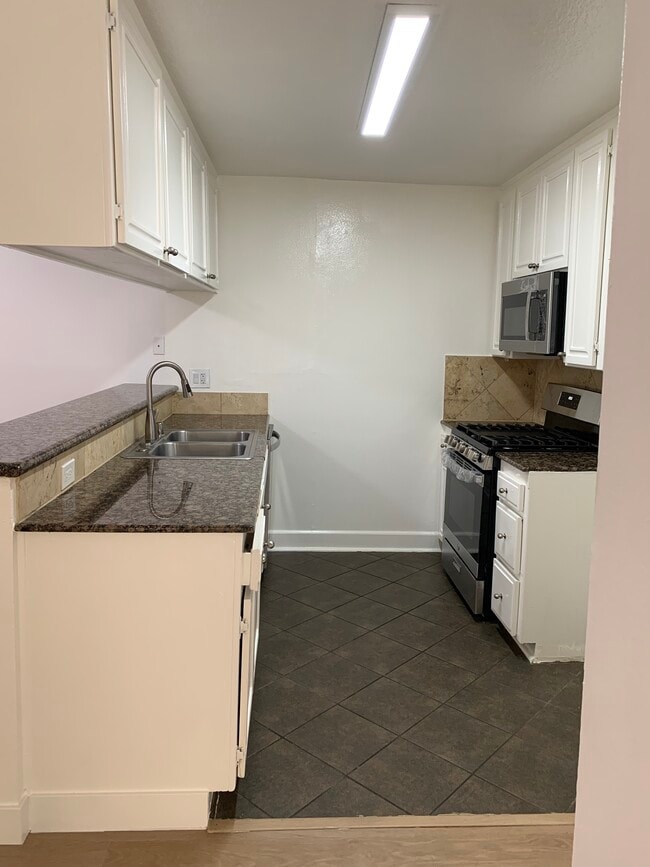 property at 7045 Woodley Ave