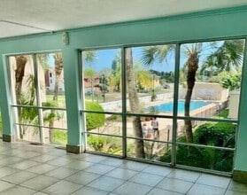 223 Columbia Dr, Unit 211 in Cape Canaveral, FL - Building Photo - Building Photo