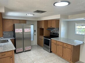 5724 Mosaic Dr in Holiday, FL - Building Photo - Building Photo