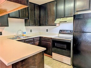 6815 Remmet Ave, Unit 222 in Los Angeles, CA - Building Photo - Building Photo