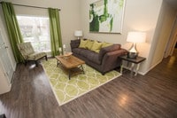 Renovated Living Area - Trailwood Village Apartments in Kingwood, Texas