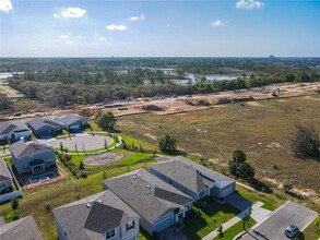 1043 Lakeshore Breeze Pl in Kissimmee, FL - Foto de edificio - Building Photo