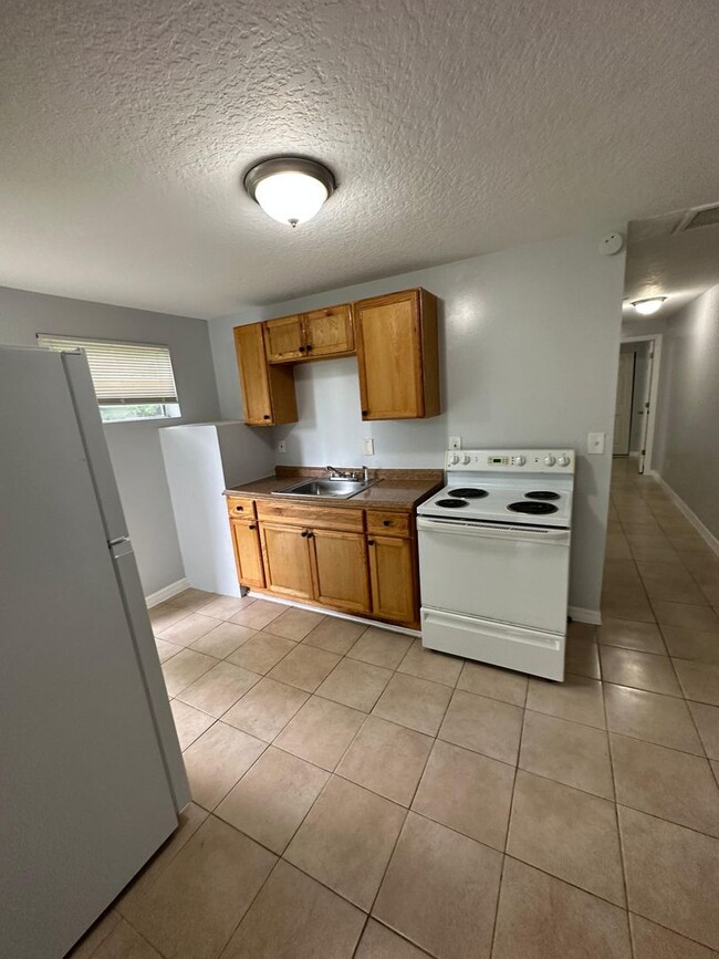 property at 1639 W 24th St