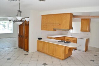 6051 Softwind Dr in Huntington Beach, CA - Building Photo - Building Photo