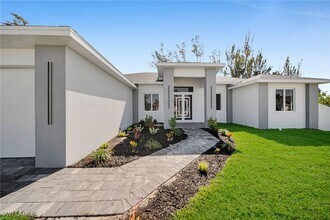 1107 NW 40th Pl in Cape Coral, FL - Building Photo - Building Photo