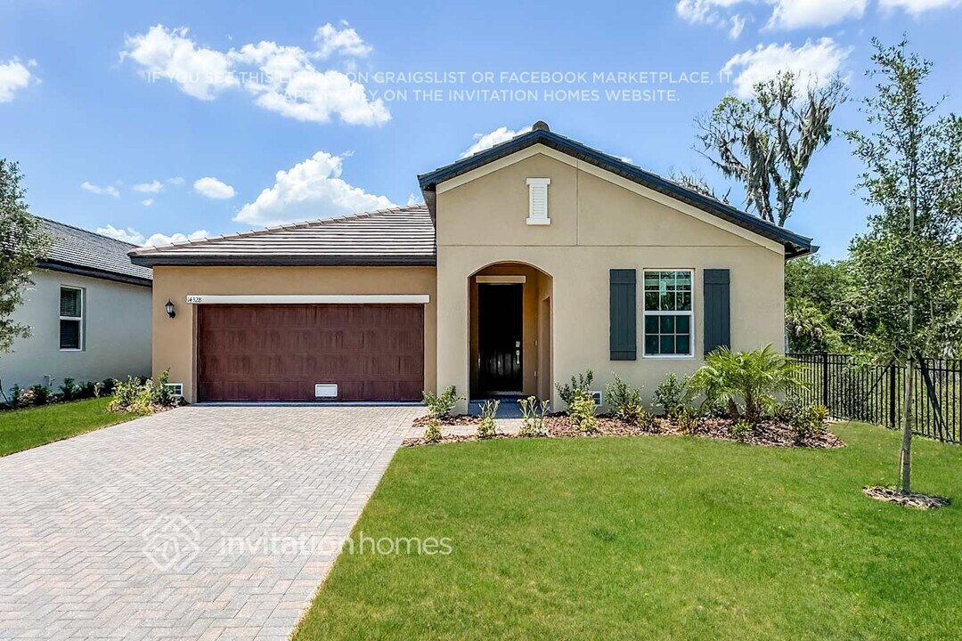 14328 20th St E in Parrish, FL - Building Photo