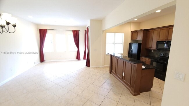 6033 NW 118th Dr in Coral Springs, FL - Building Photo - Building Photo