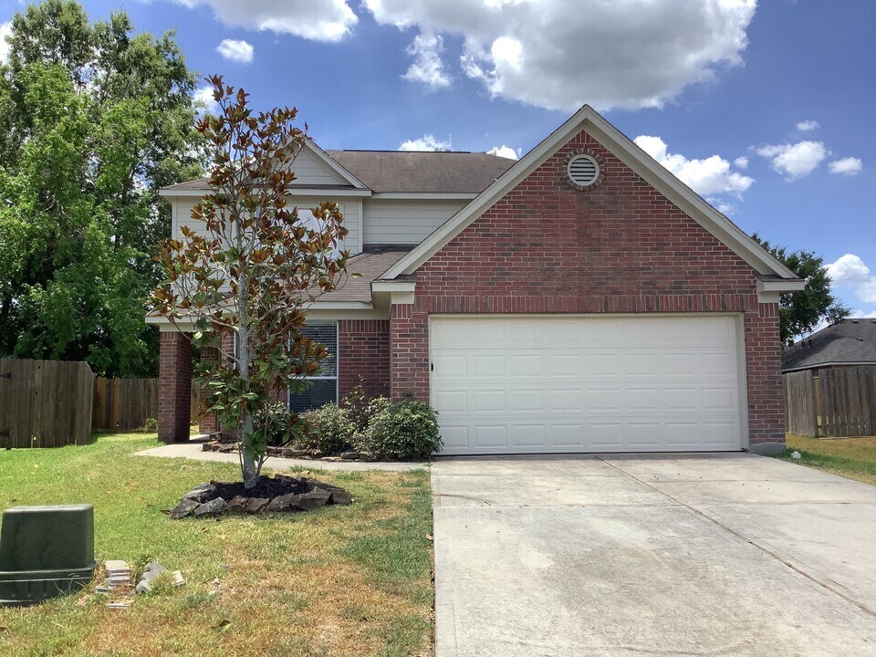 9830 Wing St in Conroe, TX - Building Photo