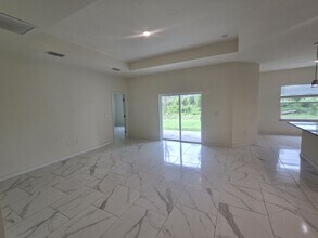 1218 Ecstasy St E in Lehigh Acres, FL - Building Photo - Building Photo