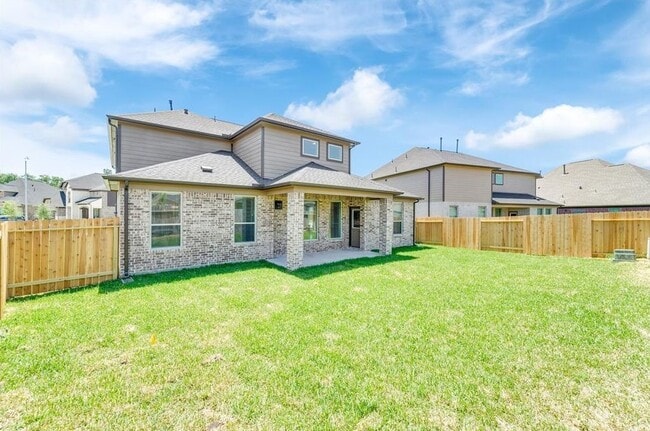 property at 18906 Whistling Oaks Dr