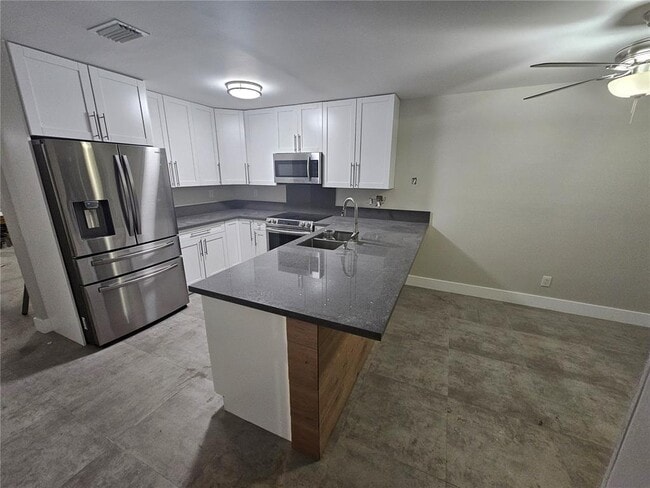 property at 7302 NW 76th Dr