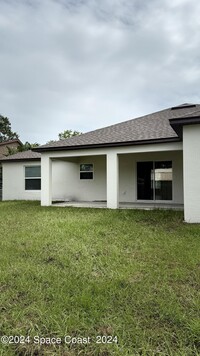 1038 Duxbury Rd SE in Palm Bay, FL - Foto de edificio - Building Photo