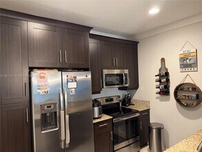 5855 Monterra Club Dr in Greenacres, FL - Building Photo - Building Photo
