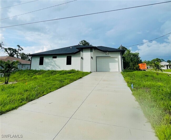 149 Meadow Rd in Lehigh Acres, FL - Building Photo - Building Photo