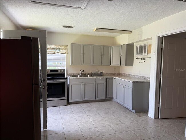 936 Washington Palm Loop in Davenport, FL - Building Photo - Building Photo