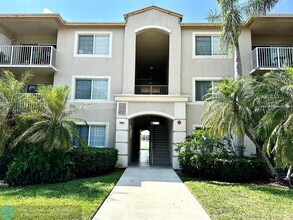 5051 Wiles Rd in Coconut Creek, FL - Building Photo - Building Photo